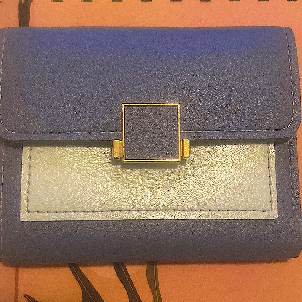 Blue wallet with gold clasp